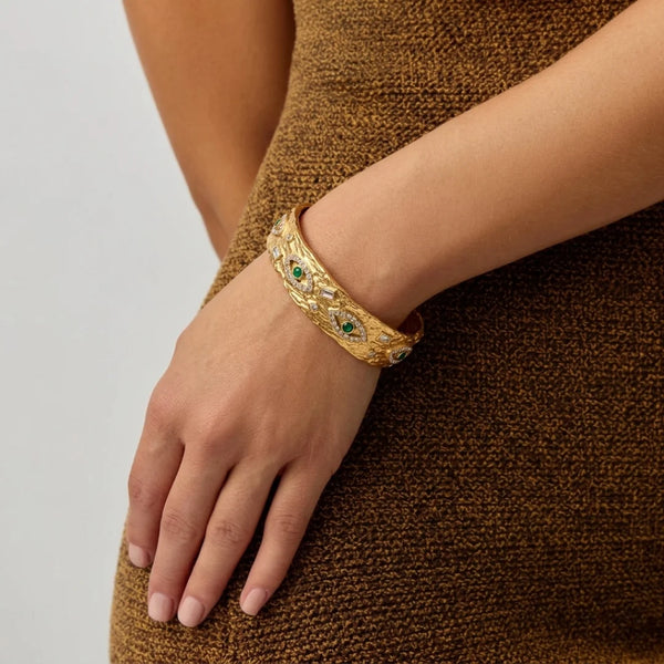 Evil Eye Cuff Bracelet worn on the wrist with a brown knit – anti-tarnish cuff bracelet for daily wear