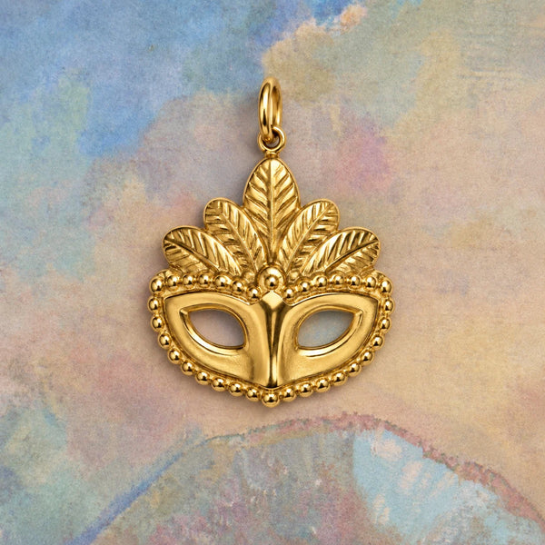 Masquerade Mask Charm on a painted canvas background – anti-tarnish charm for daily wear