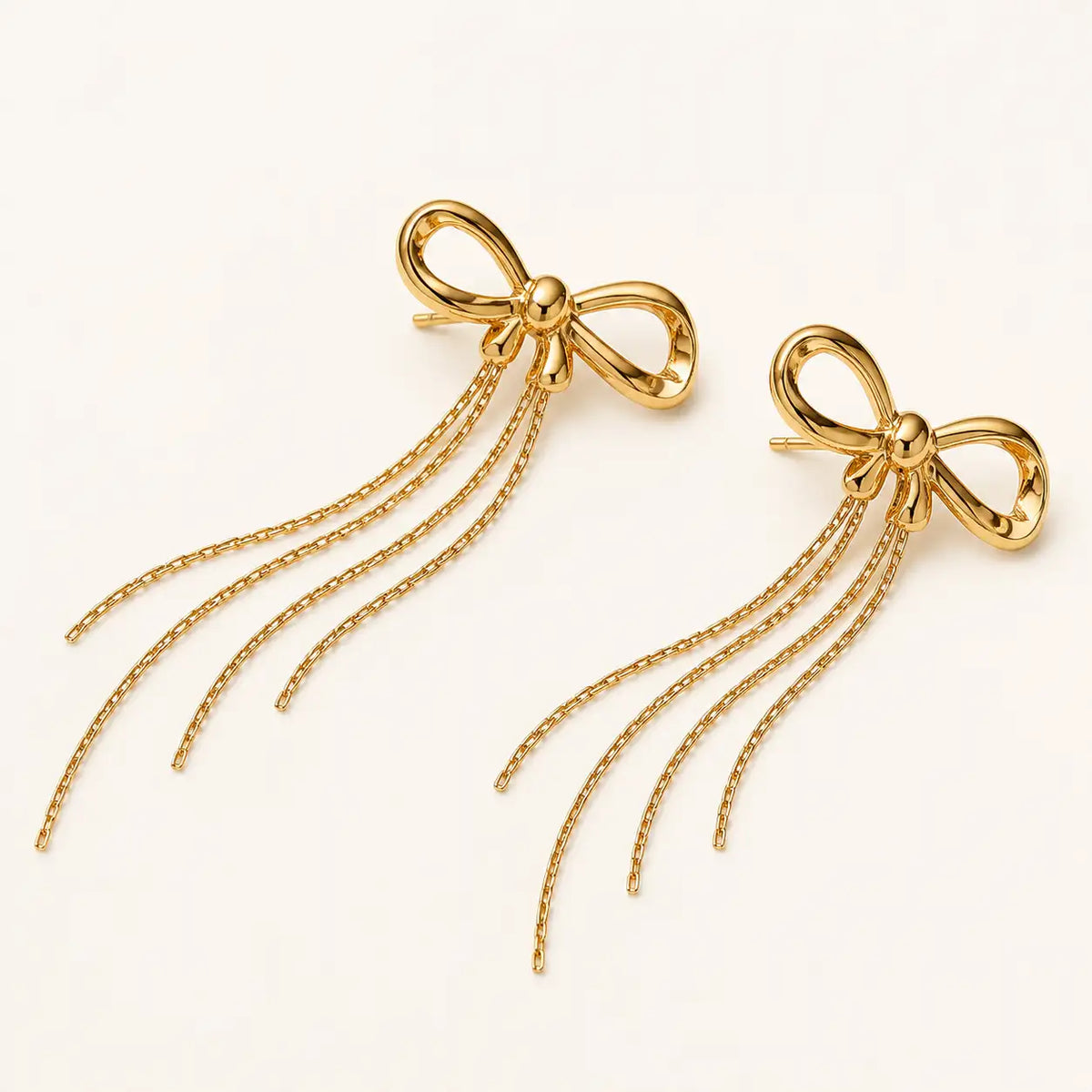 Aurielle Bow Drop Earrings – waterproof drop earrings for women, bow studs with long chain tassels, anti-tarnish 18K gold PVD | Priskel Jewellery