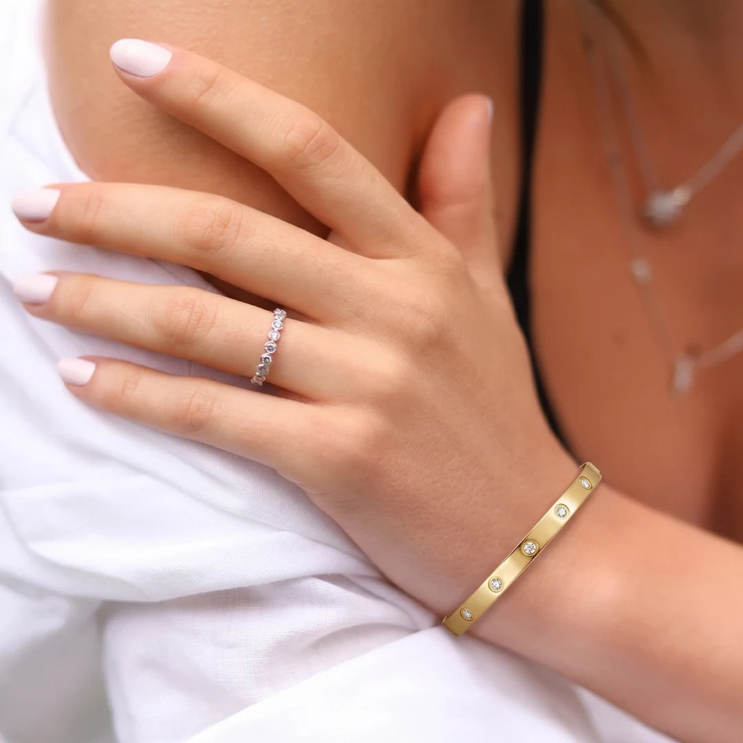 Bezel Crystal Bangle worn on the wrist against white fabric – anti-tarnish bangle for daily wear