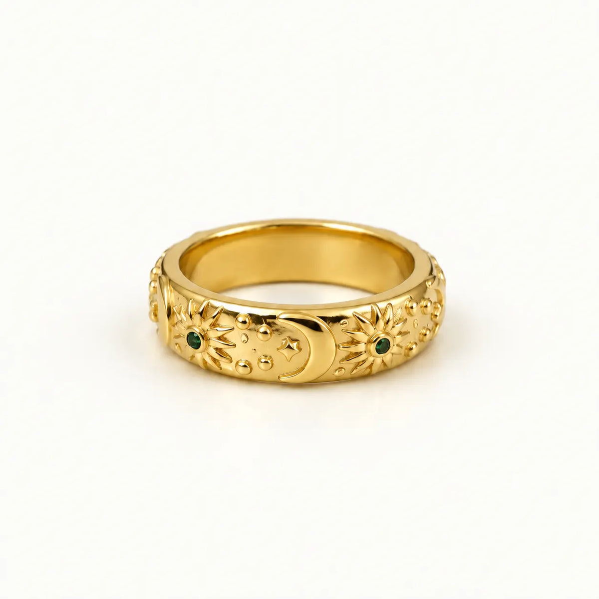 Celestial Emerald Ring, side view of the band showing the sculpted sky motifs, waterproof gold ring