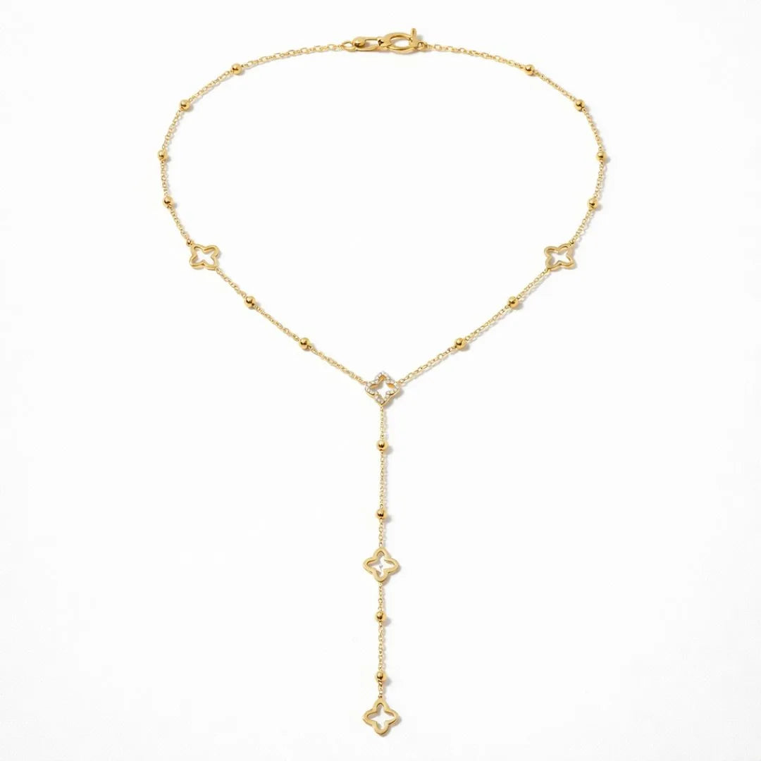 Clover Lariat Necklace laid out on white showing the crystal flower motifs – lariat necklace you can wear in the shower
