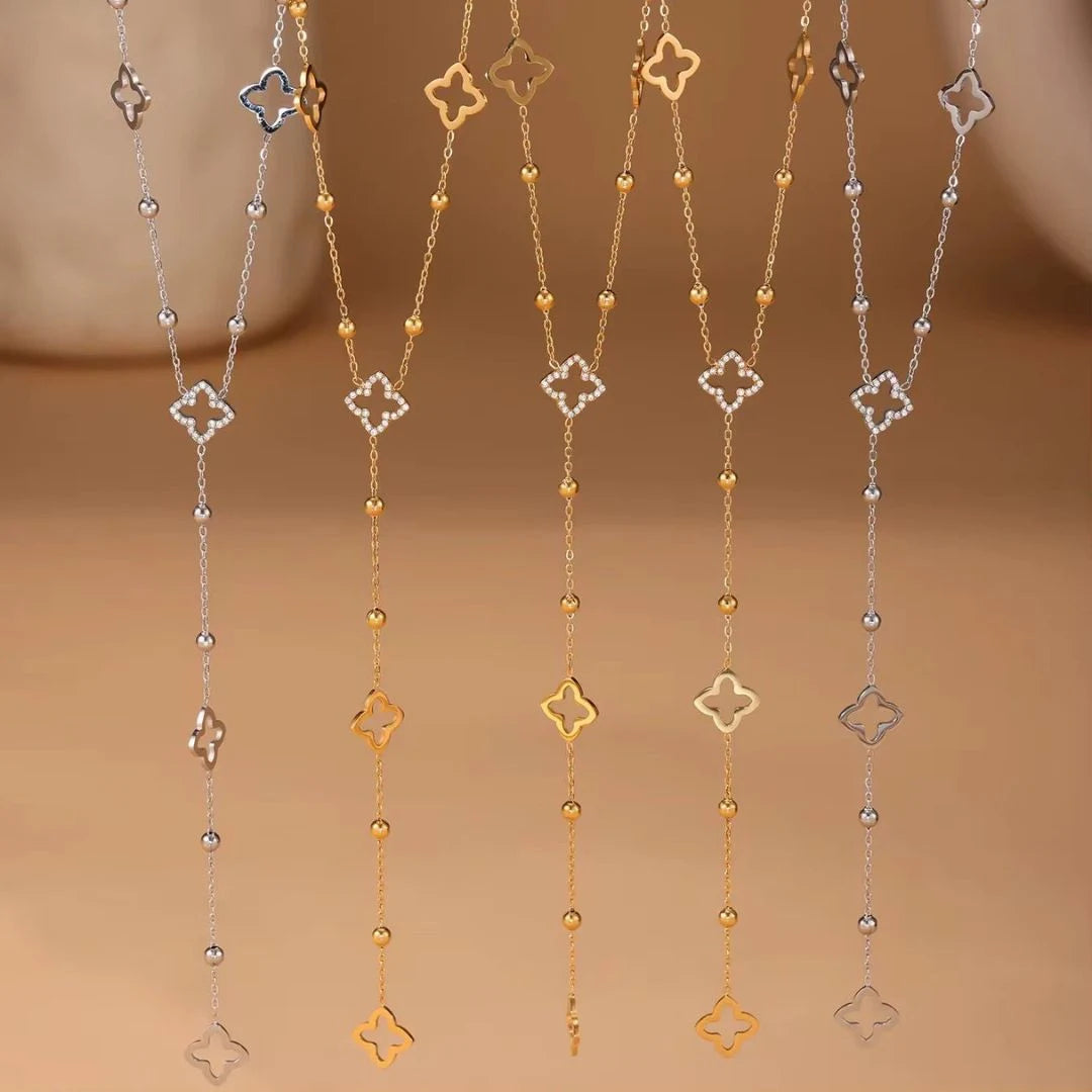 Clover Lariat Necklace – several lariat necklaces hanging side by side, anti-tarnish lariat necklace for daily wear