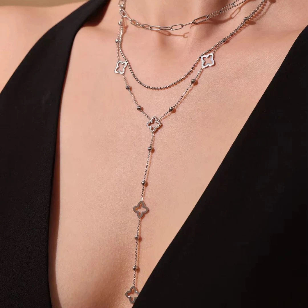 Clover Lariat Necklace worn with a black top, full drop visible – sweatproof, hypoallergenic lariat necklace