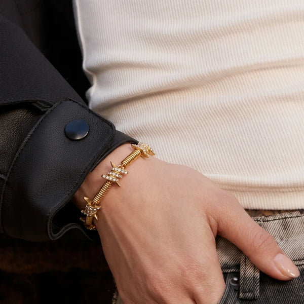 Crystal Coil Bracelet worn on the wrist with a black jacket – anti-tarnish chain bracelet for daily wear