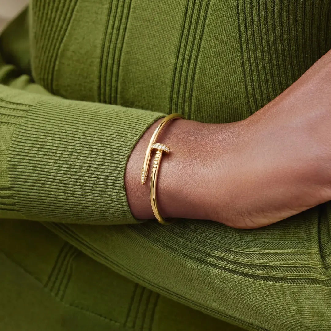 Crystal Nail Bangle worn on the wrist with a green knit sleeve – anti-tarnish bangle for daily wear