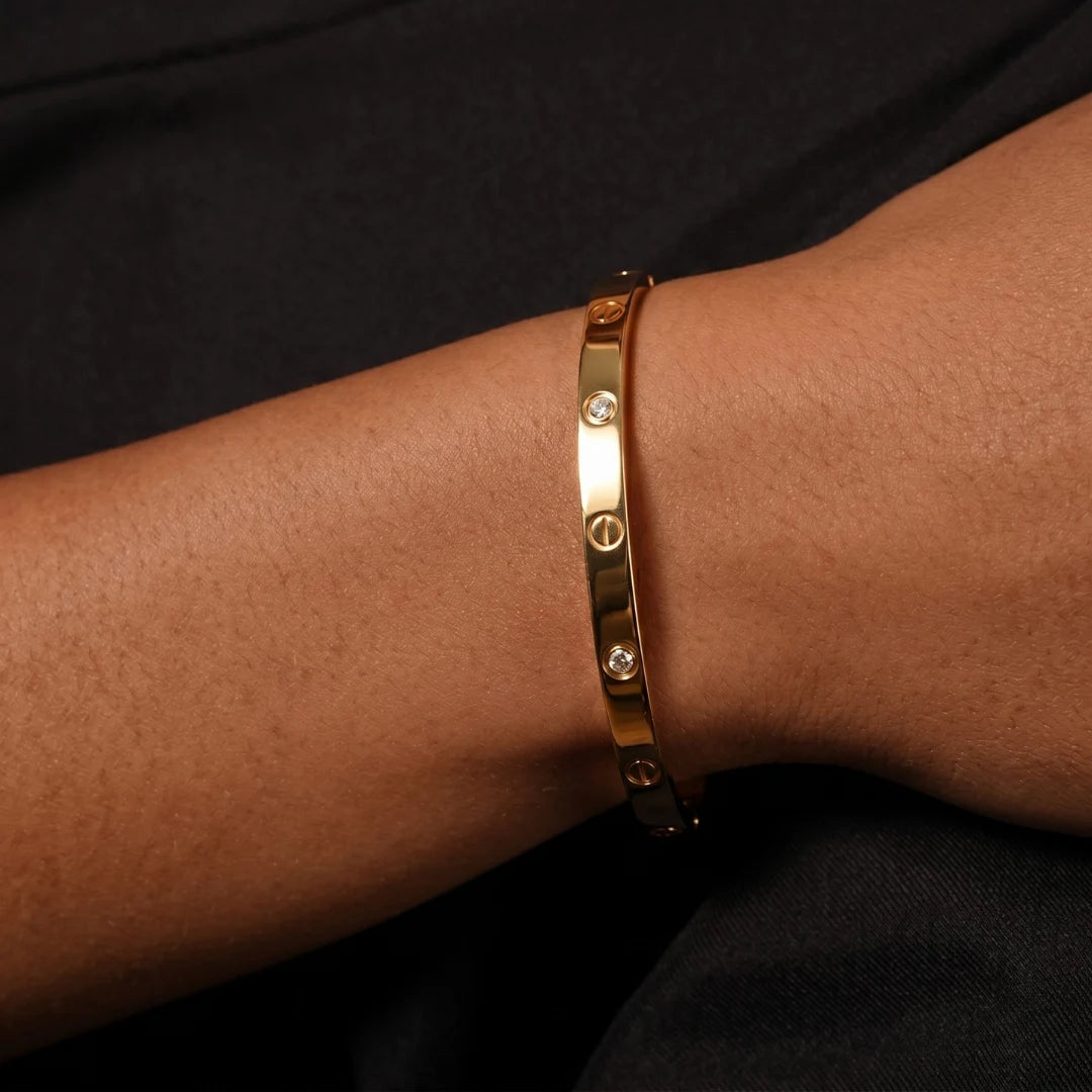 Crystal Screw Bangle worn on the wrist against a black top – bangle you can wear in the shower