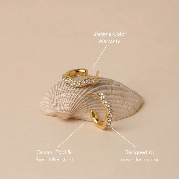 Elara Pavé Hoops on fabric with size labels – size and material details