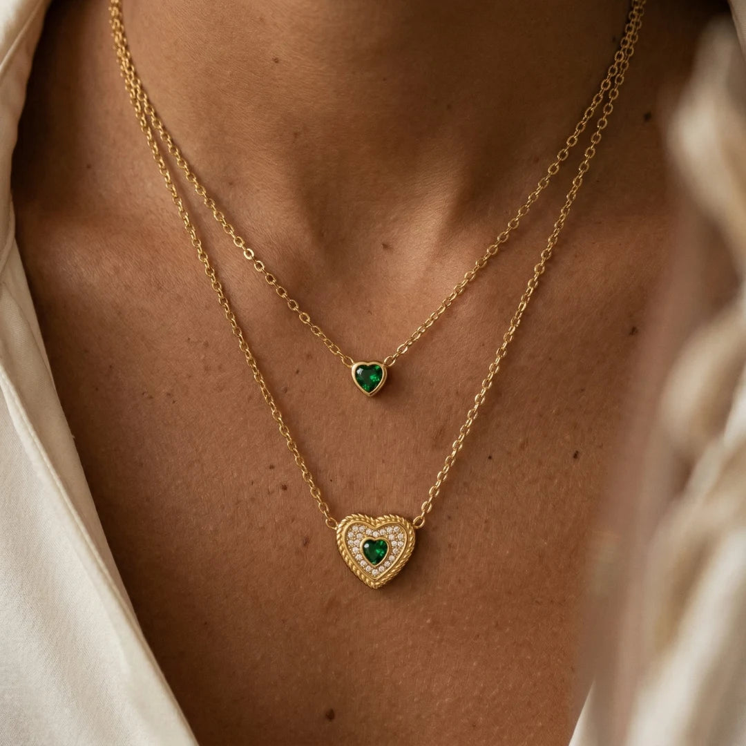 Emerald Heart Layered Necklace worn by a model in a white top – waterproof layered necklace for women in anti-tarnish 18K gold PVD | Priskel Jewellery