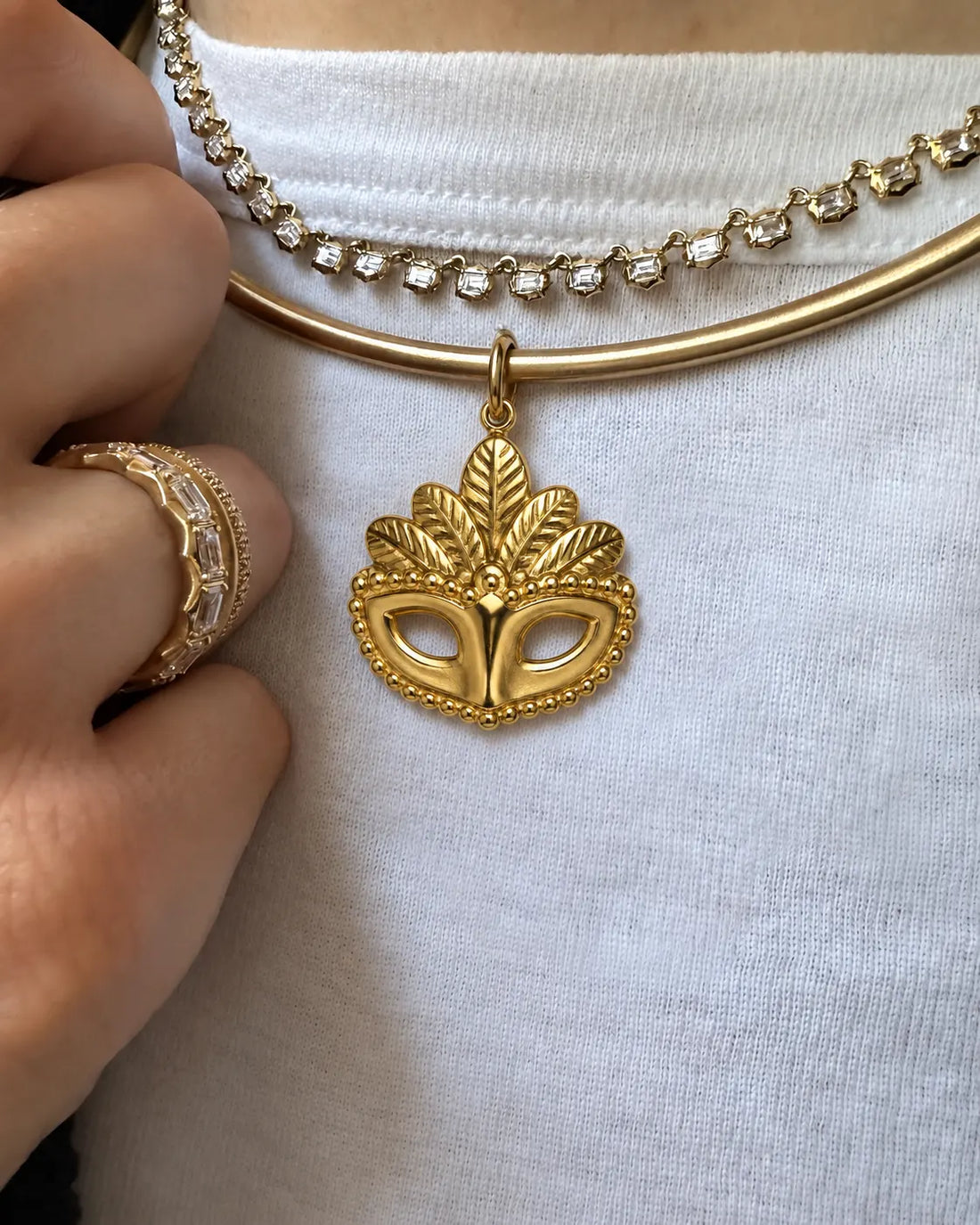 Masquerade Mask Charm worn layered with gold chains, waterproof gold charm