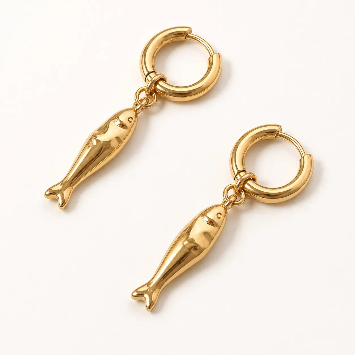 Matsya Hoops – waterproof hoop earrings for women, small gold hoops with sculpted fish (Matsya) charms, anti-tarnish 18K gold PVD | Priskel Jewellery