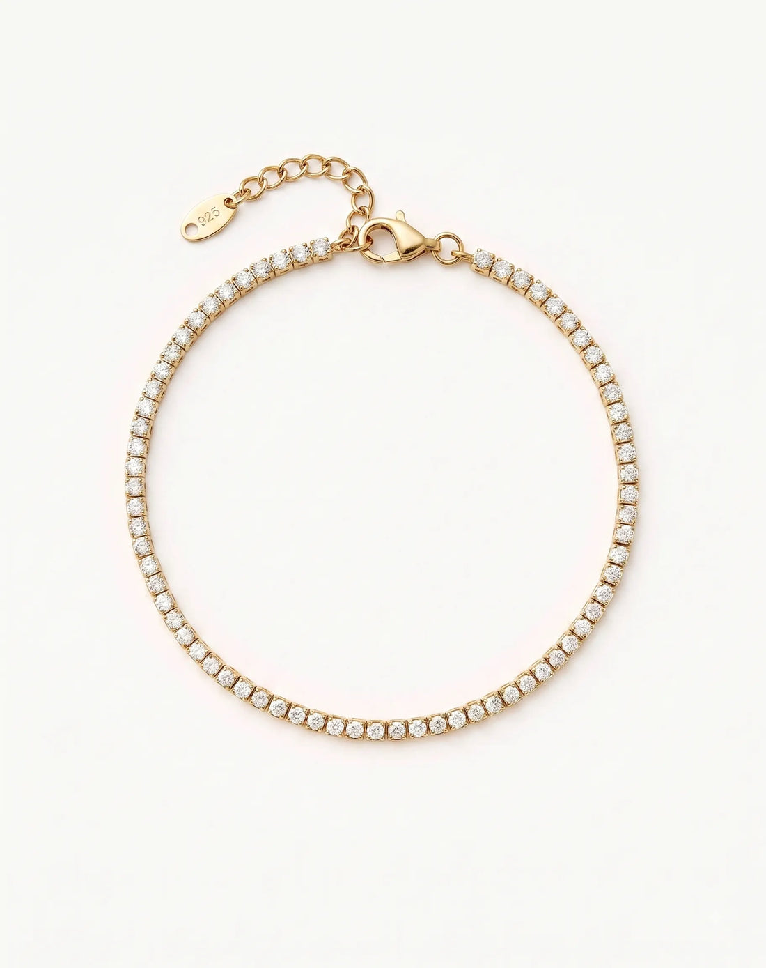Noir Tennis Bracelet laid out on white, waterproof gold men's tennis bracelet