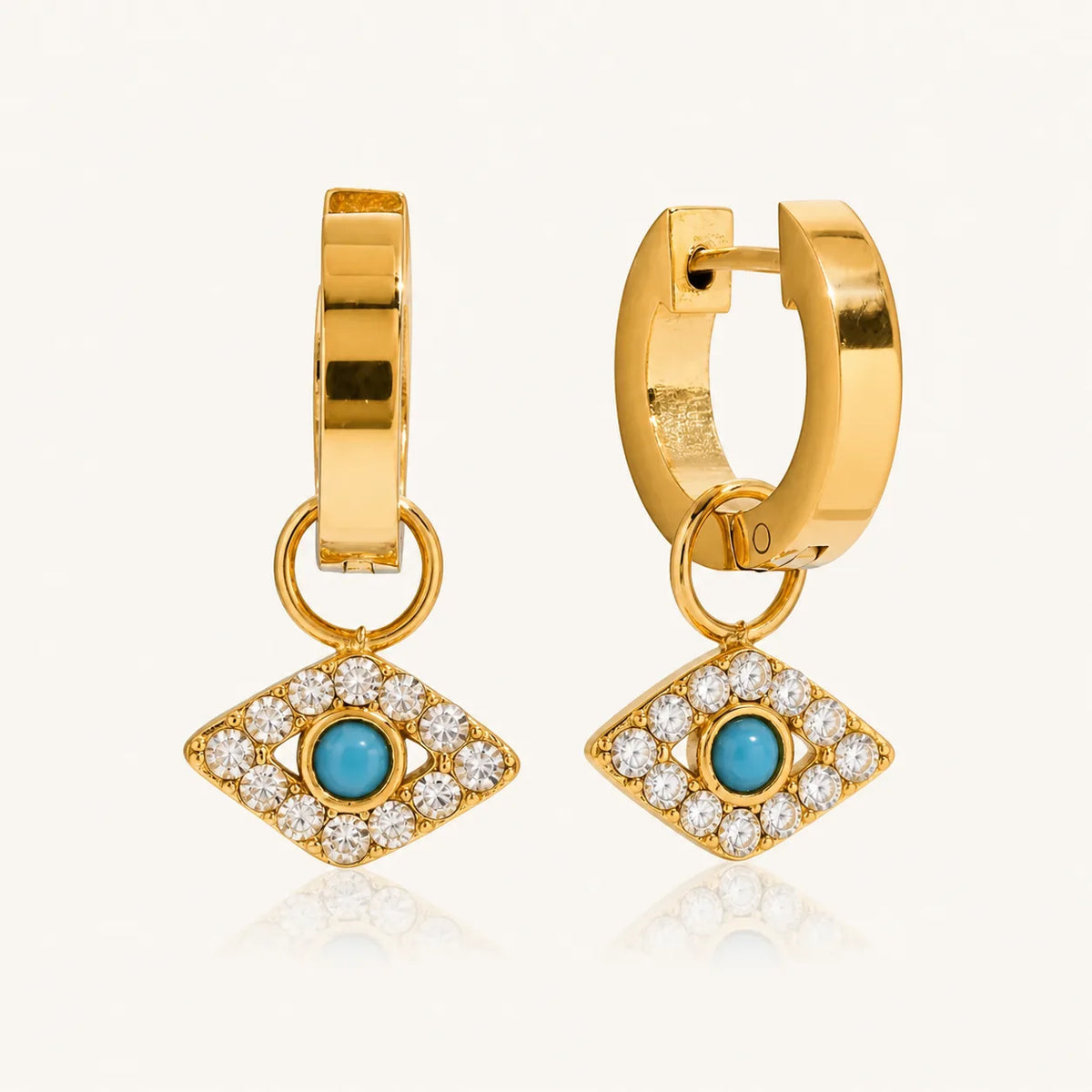 Nazar Charm Hoops – waterproof evil eye earrings for women, gold huggies with pavé evil eye (nazar) charms, anti-tarnish 18K gold PVD | Priskel Jewellery