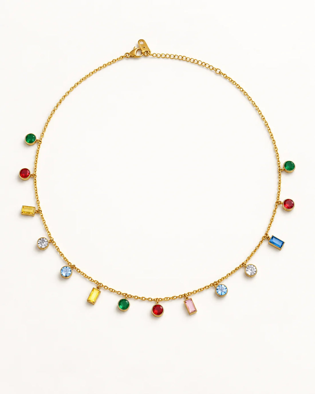 Rainbow Dainty Multi Charm Necklace laid out in a circle on white – anti-tarnish charm necklace for daily wear