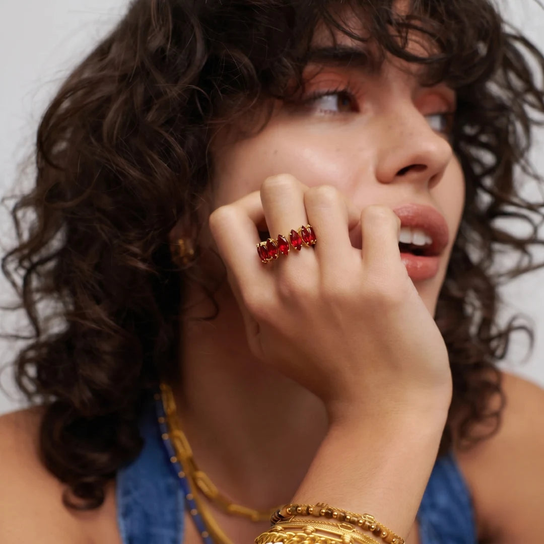 Ruby Crown Ring worn on the finger, hand at the cheek – anti-tarnish statement ring for daily wear