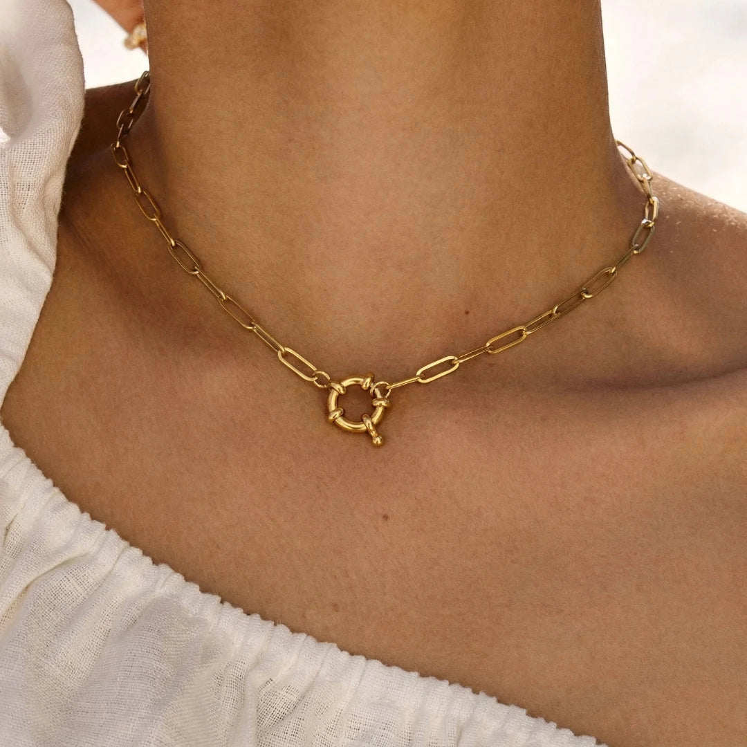 Toggle Link Necklace worn on the neckline with a cream top – waterproof link necklace for women in anti-tarnish 18K gold PVD | Priskel Jewellery