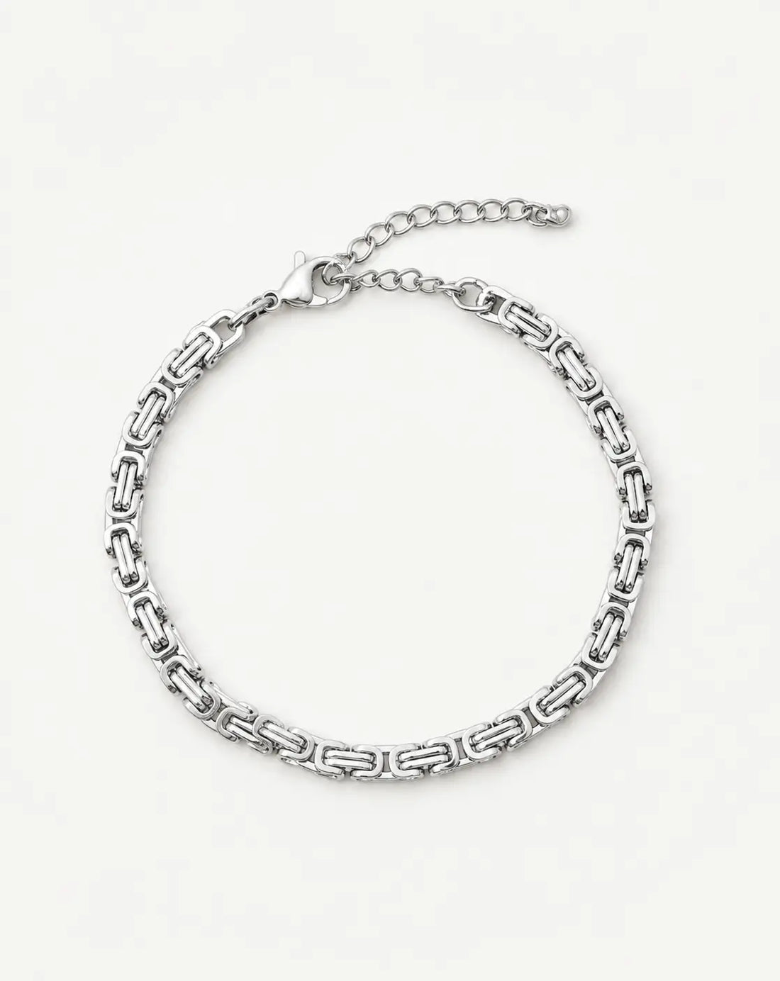 Vector Link Bracelet – silver-tone bracelet laid out on white, waterproof stainless steel men's link bracelet